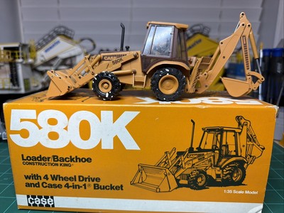 1:35 Conrad Case 580K Loader Backhoe 4 Wheel Drive 4-in-1 Bucket