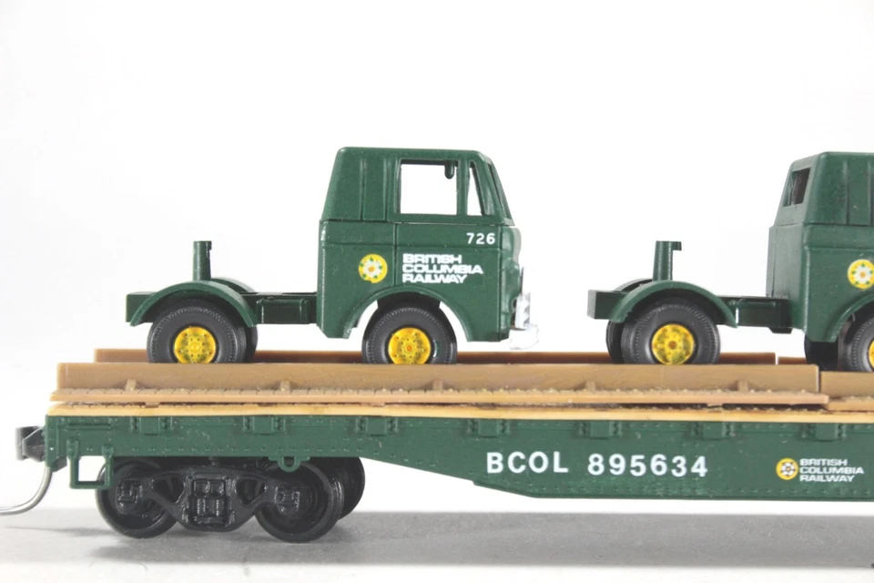 HO Tyco Cust BC Rail 50ft Flat Car BC Rail Semi-Tractors Athearn Trucks KD Cplrs - Image 2 of 4