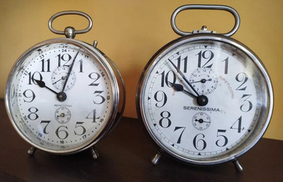 2  hundred-year-old Junghans alarm clocks, functional, signed, 1920s