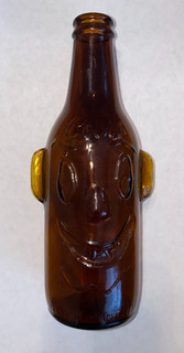 Vintage Coors clown face amber bottle empty