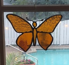 Pare soleil papillon en verre teinté ambré vintage années 70