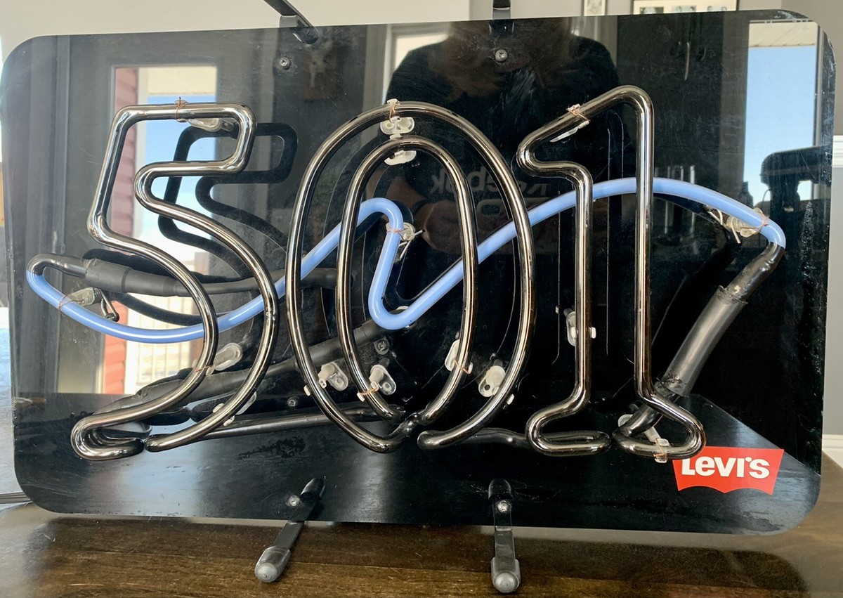 Levis neon sign, model 501-14, red and blue neon on black, 35.5cm