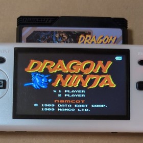 There is a box theory Dragon Ninja Namco Famicom FC Retro game Seal missing
