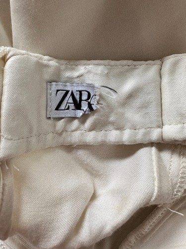 Falda Zara efecto satinado nudo marfil midi talla XS - Imagen 5 de 5