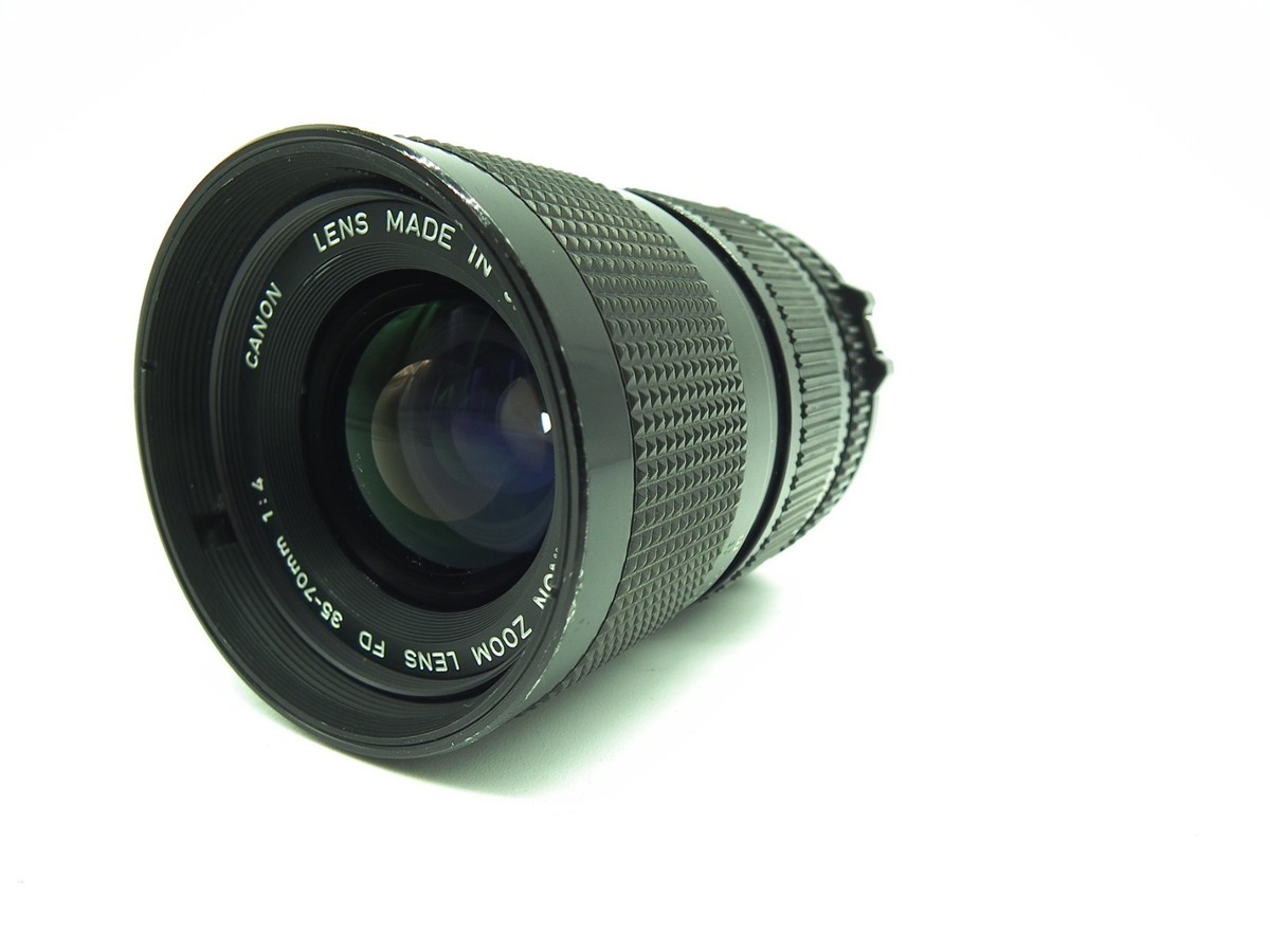 Canon A-1 35mm Film Camera Black + New FD 35-70mm F4 Lens