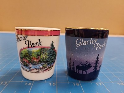 Lot of 2 Glacier National Park Shot Glasses LIPCO Souvenir Elk Deer Wolf Eagle