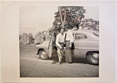 1949  MERCURY 2-dr, b&w photograph 4 1/2'' x 3 1/4''. Two guys trading positions.