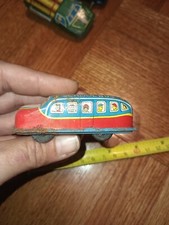 VINTAGE VERY OLD TIN SCHOOL BUS WITH ILLUSTRATED PEOPLE INSIDE MADE IN THE 50