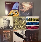 Classic rock vinyl lot featuring Led Zeppelin I , David Bowie, Eagles& More Read