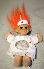 1992 Russ berrie troll nurse doll, cross, clear stomach area