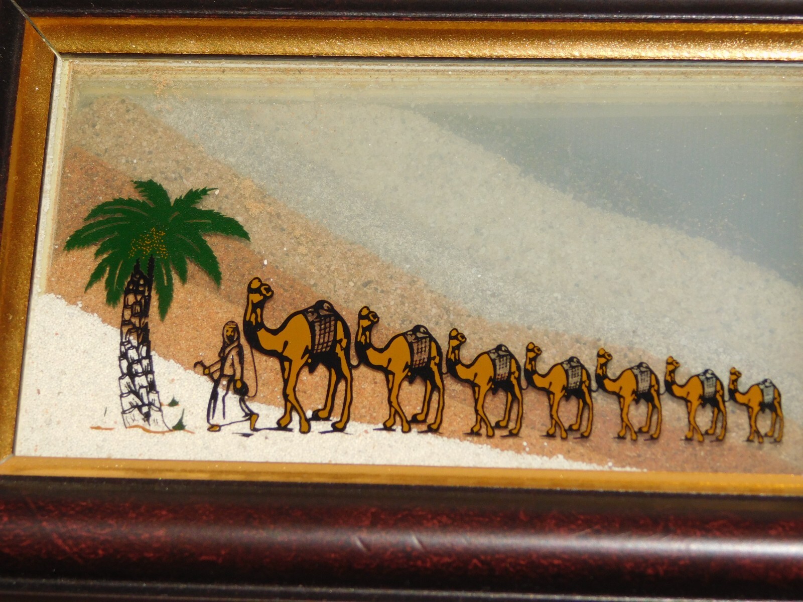VINTAGE HANDMADE  7" X 5" U. A. E. SAND FROM 7 EMIRATES CAMELS FRAMED SOUVENIR