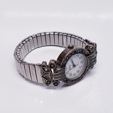 Elegant Vintage Womens Faberge Watch Stainless Steel Silver Toned Round Face