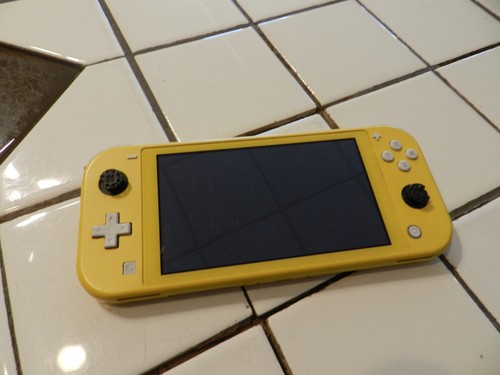 Nintendo Switch Lite Yellow Console hdh-001 for parts/not working