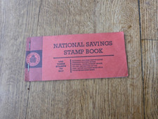 Vintage National Savings Stamp Book with six stamps