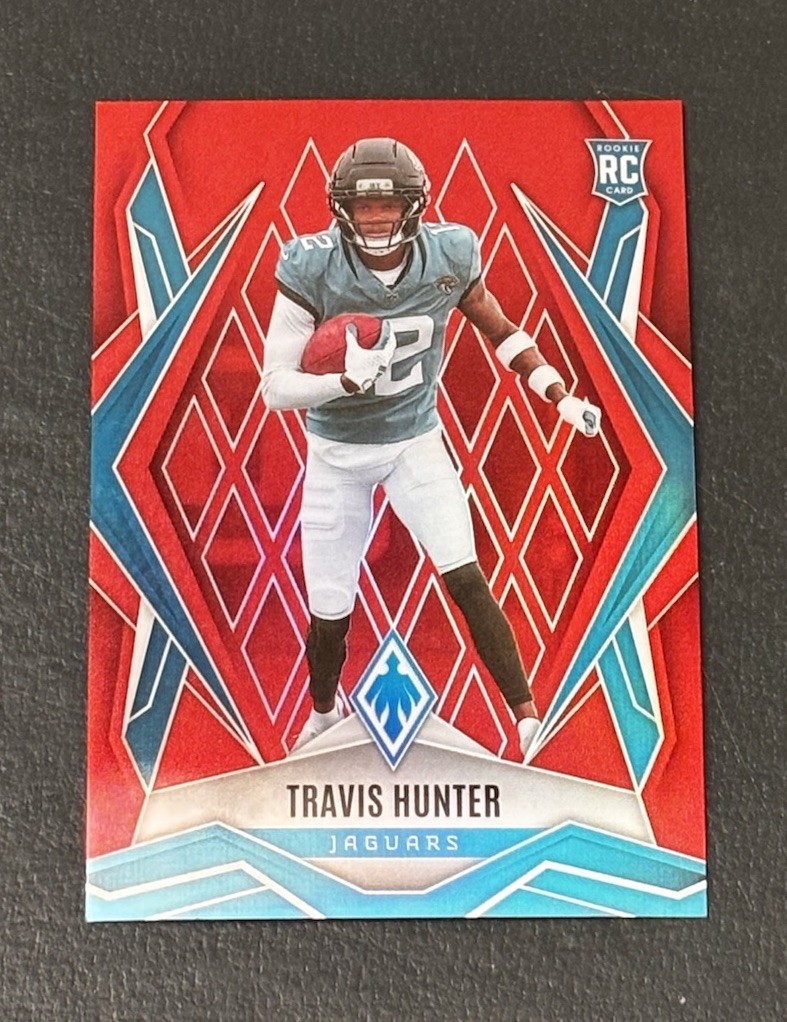 2025 Panini Phoenix Rookie Travis Hunter Red SP 17/99 Card #157 Jaguars RC