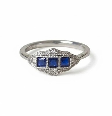 Princess Cut Simulated Blue Sapphire Anniversary Ring In 14K White Gold Plated