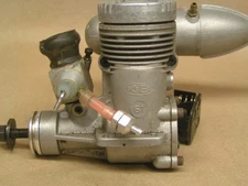 K&B .61 w/muffler, very clean, good compression.....