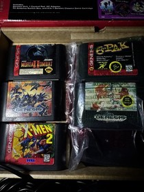 Sega Genesis Model 2 Console with 3 Controllers and Sonic 2 6-Pack Xmen 2 CIB