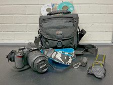 Nikon D3100 Camera w/Nikon DX 18-55mm Lens / Bag / CD's / 2 Straps *Tested