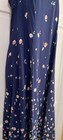 Navy blue midi dress with small white floral print, scoop neckline, and “E.D. Michaels 80s USA Made” label on hanger.