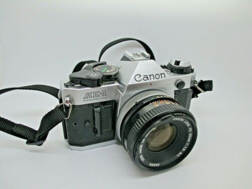 Canon AE-1 Programm Spiegelreflexkamera 35 mm + 50 mm 1:1,8 Canon Objektiv FUNKTIONIERT TOP!!! - Bild 1 von 5