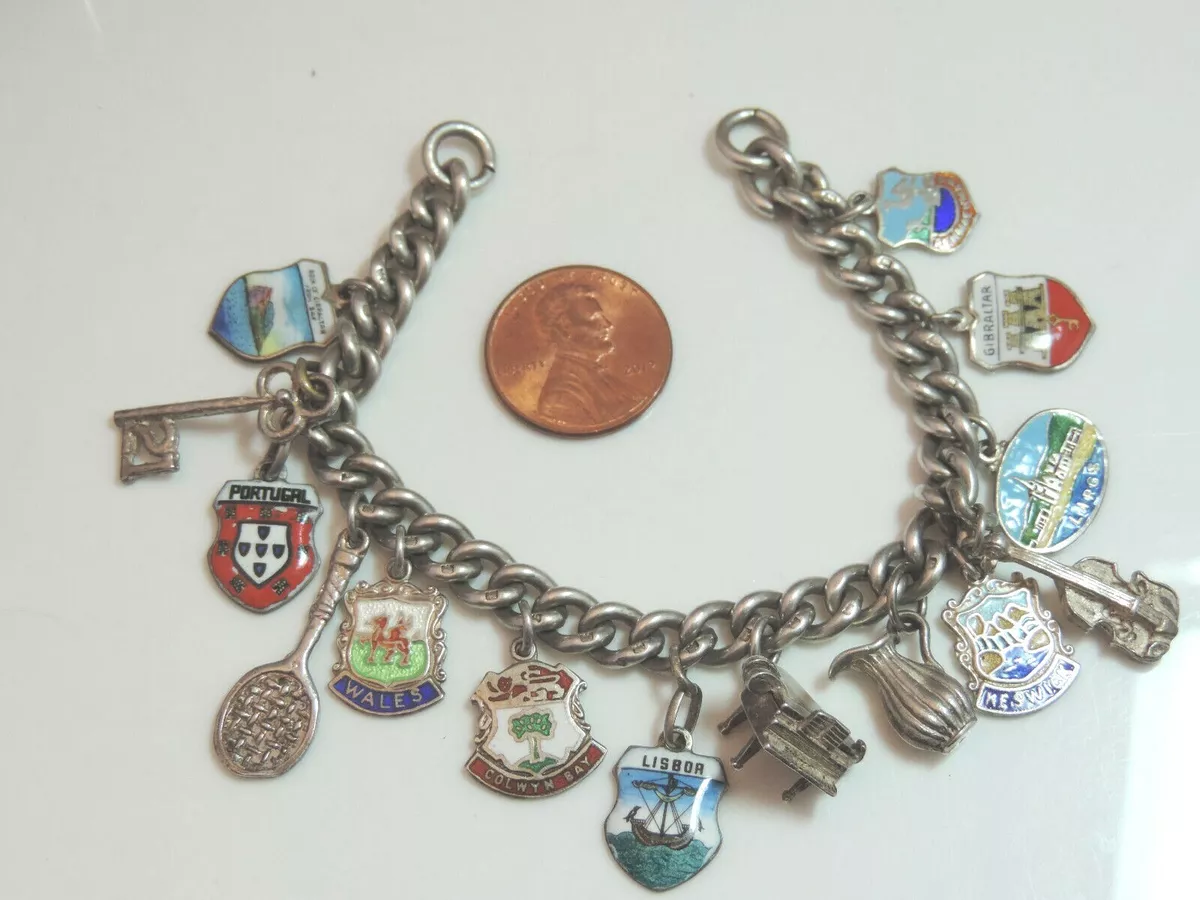Travel charm bracelet deals
