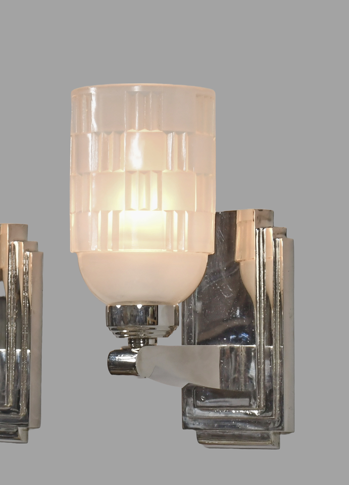 FRERES a pair of opalescent French 1930 art deco wall sconces