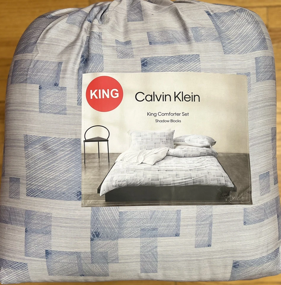 JUEGO DE EDREDÓN KING CALVIN KLEIN SHADOW BLOCKS AZUL GRIS CON FUNDAS Foto 2 de 2
