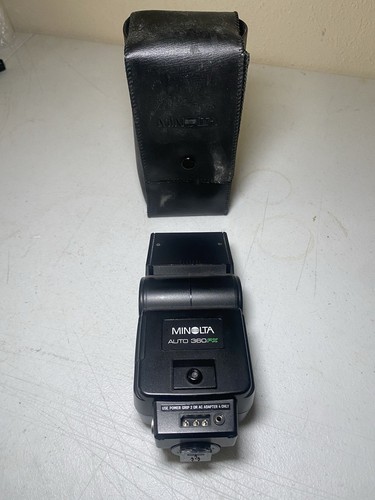 Minolta 360PX Dedicated TTL flash w/ Branded cover.
