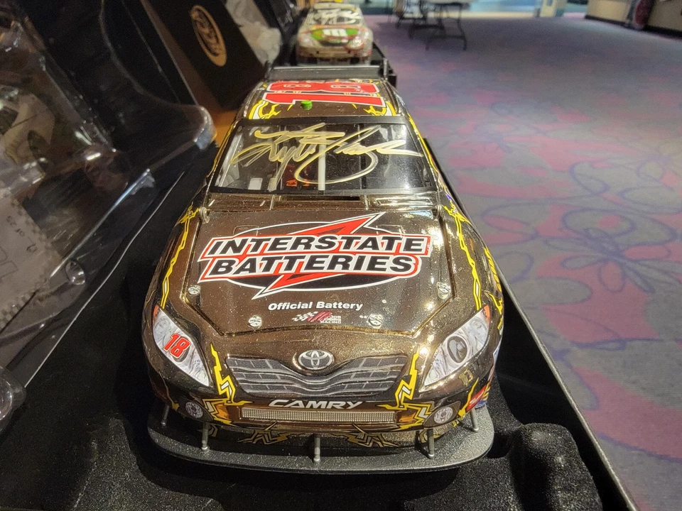 2010 Kyle Busch #18 AUTOGRAPHED Interstate Batteries 1/24th ELITE - White Gold - Image 2 of 4