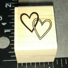 Two hearts hooked together, unknown maker,c31,rubber