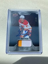 Connor Zary 2023-24 Upper Deck Engrained Mahogany Auto Mem /25 Signed Patch