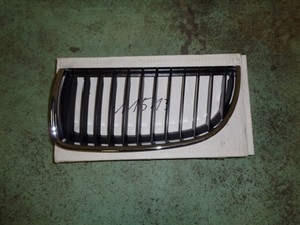 BMW E90 E91 Kühlergrill links 7120007 neu original