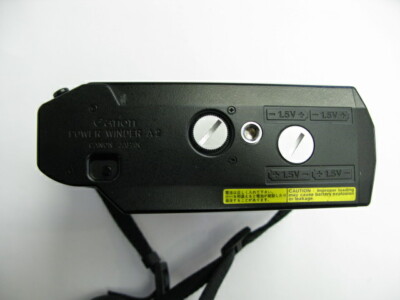 Canon A-1 film camera body with Genuine strap and Power Winder A2