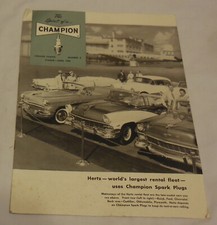 1956 ad The Spirit of a Champion spark plug V...