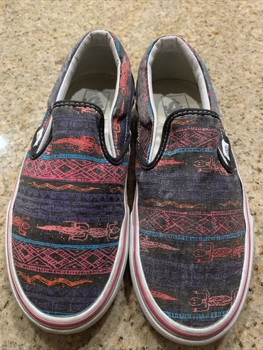 low top black checkered vans