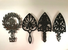 Vintage Lot of 4 Large Cast Iron Kitchen Trivets Eagle Heart  2 Shield Designs