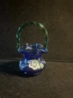 FENTON - SIGNED COBALT BLUE FLORAL BASKET WITH GREEN CREST AND HANDLE