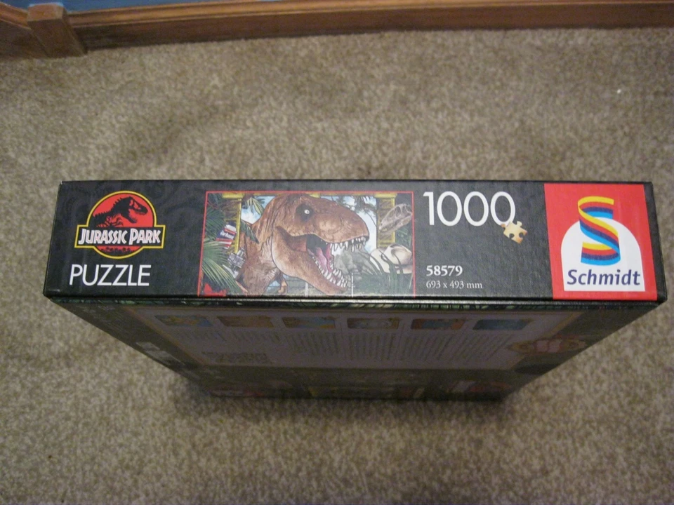 SCHMIDT 1000 PIECE PUZZLE JURASSIC PARK: THE ERA OF THE DINOSAURS CHECK FALL PZL - Image 2 of 4