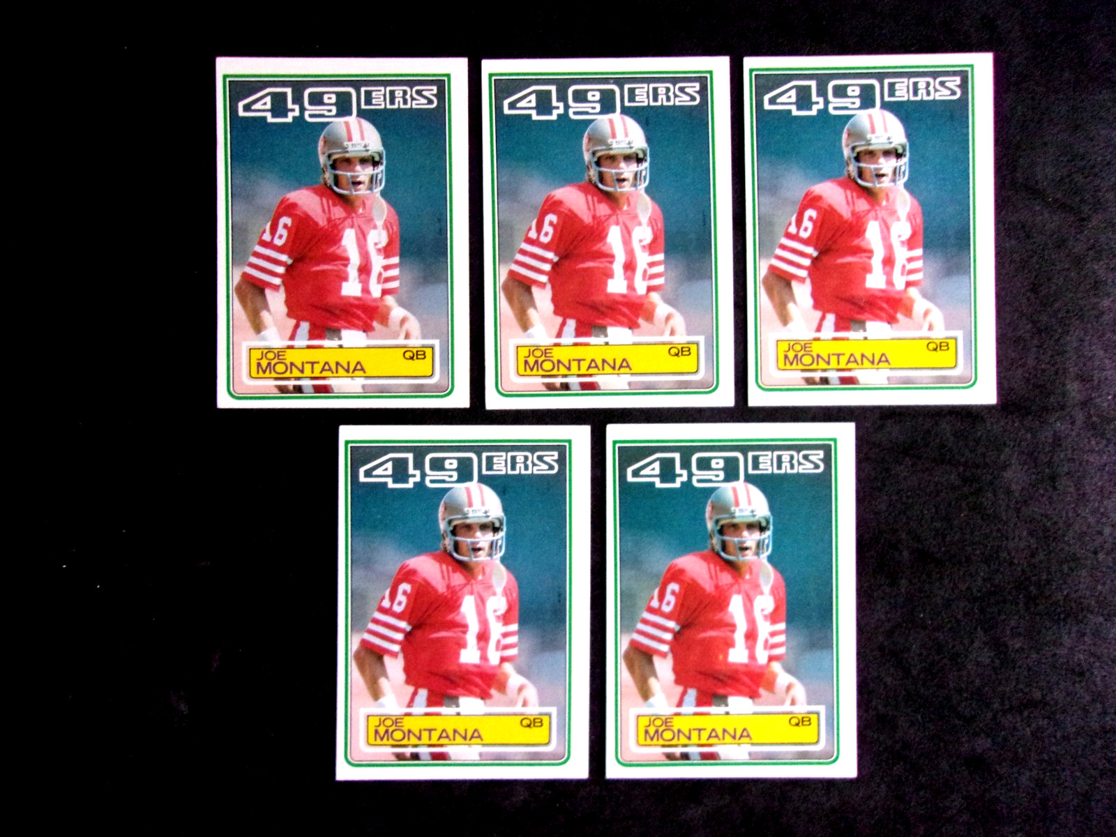 5 CARD 1983 TOPPS #169 JOE MONTANA..NO CREASES...OFF-CENTER..49ERS..HOFAMER