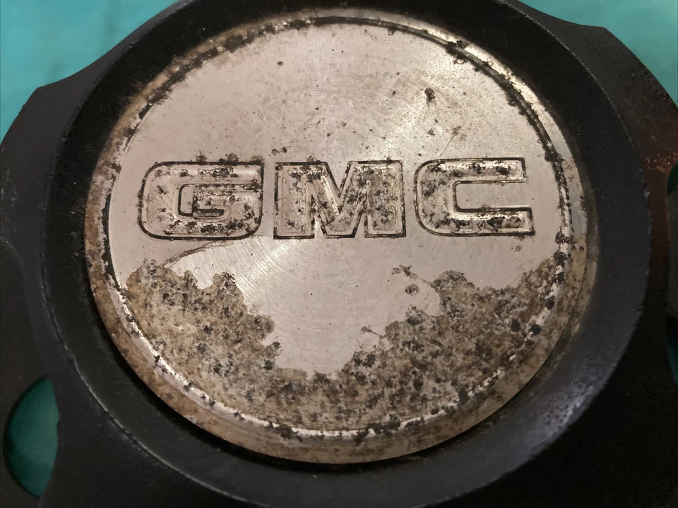 Tapacubos tapacubos GMC SAFARI VAN 1985-1995 15594373 15594372 NEGRO FABRICANTE DE EQUIPOS ORIGINALES OE Foto 2 de 4