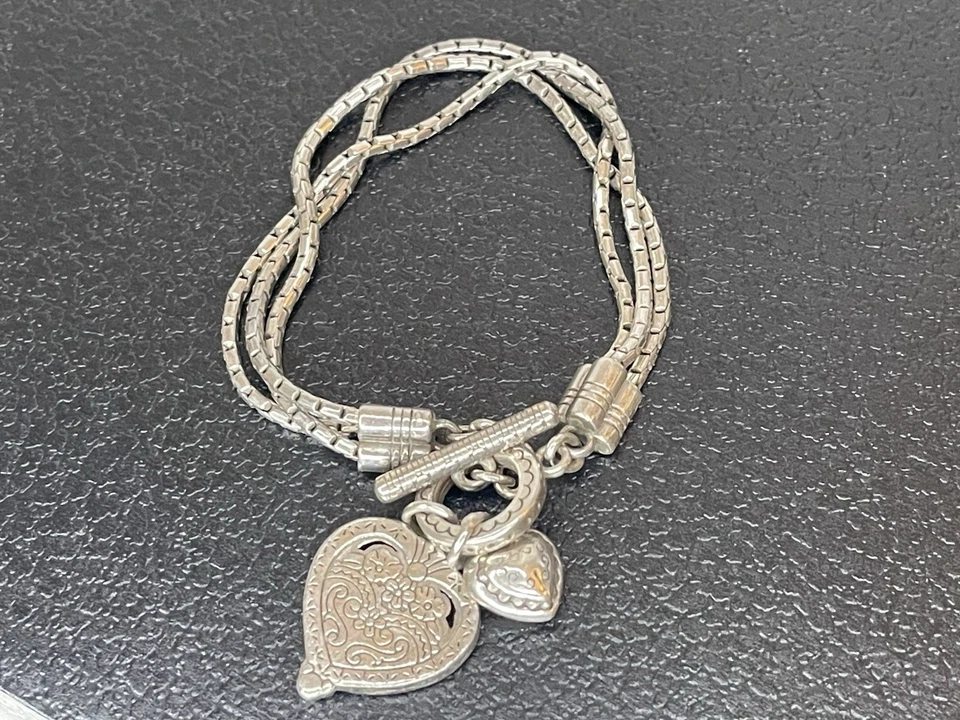 Brazalete Brighton Dos Corazones Amarillo Negro Flor Palanca Plateado Plato Dije Foto 2 de 3