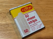 Caja de hojalata de 50 tiras transparentes marca cooperativa