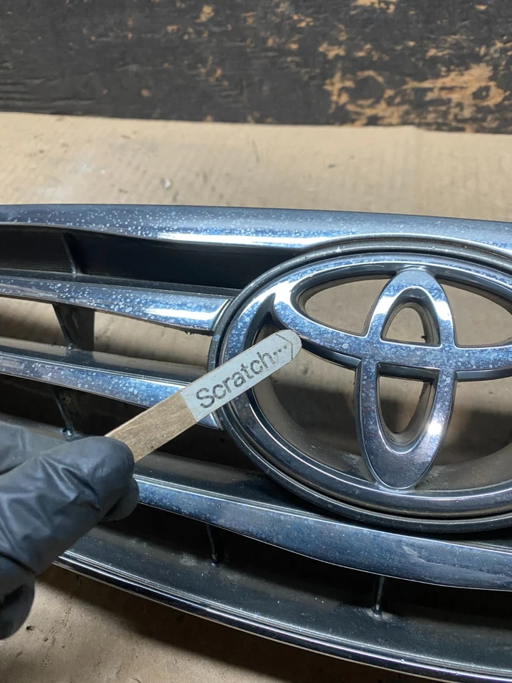 Parrilla superior delantera Toyota Camry 2005 a 2006 fabricante original u7694 DG Foto 4 de 4