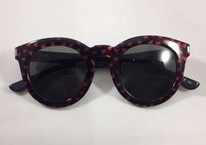 gafas corazon ysl