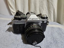Canon AE-1 Progam 35mm Film SLR Camera with Canon FD 50mm f/1.8 Lens