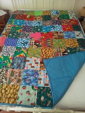 New Handmade Quilt 60" x 80" Tied Whimsical Fun Patches Blue backing, Reversible