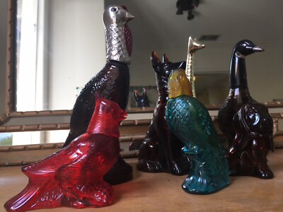 Set of seven Avon animal bird perfume bottles dogs, parrot, duck