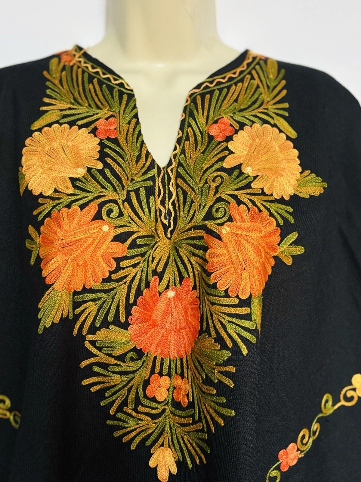 Handmade Embroidered Poncho – Black Floral Poncho with Fringe Boho Chic Cape
Opens in a new window o