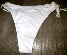 womens SOLID WHITE SWIM WEAR BOTTOMS ties on sides size SMALL NICE